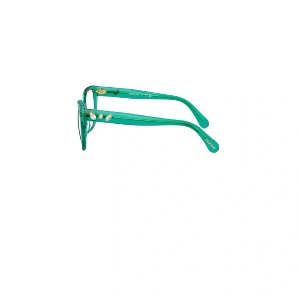 Swarovski green glasses